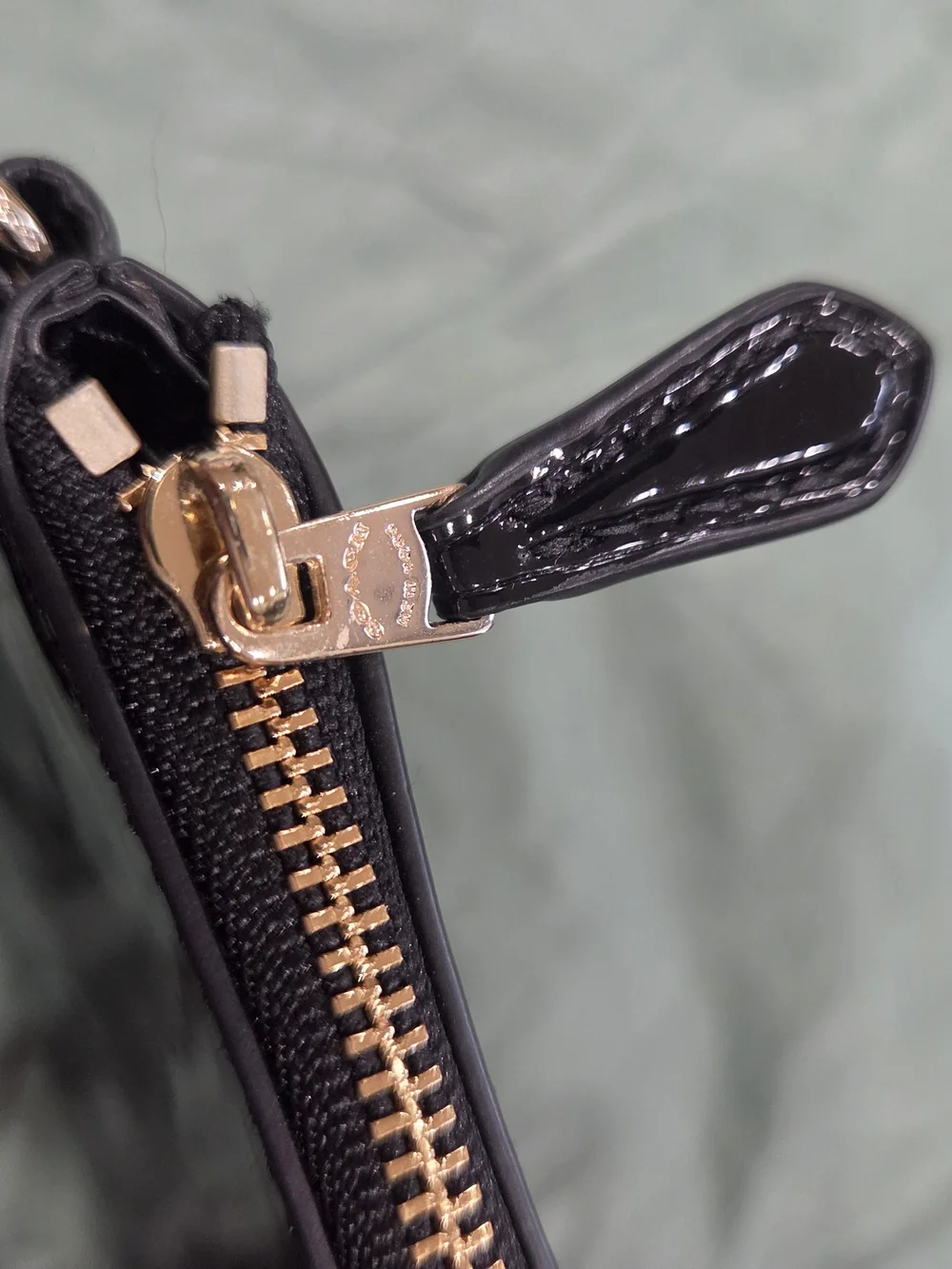 Coach sleek black
